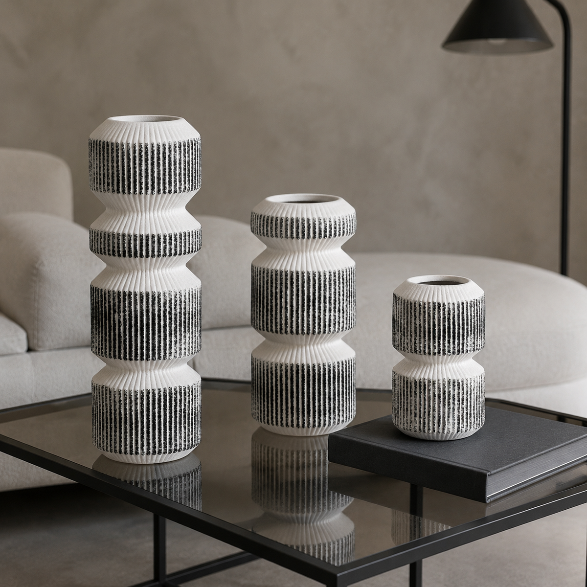 Dune Vase trio on a contemporary smoked glass table
