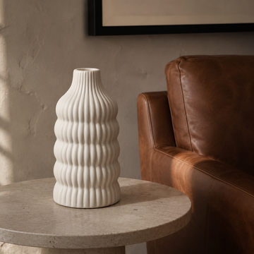 Rhythmcurve Vase in a contemporary reading corner
